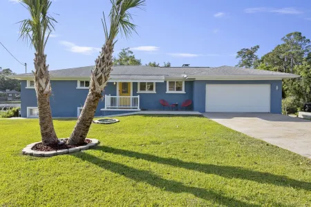 Twin Palms - water views! close to downtown Ocean Springs! With game room & dock