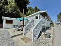 Waterfront Cabin on Camano Island with hot tub and outdoor patio.
