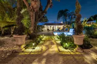 Private Oasis • 1 Mile to Beach • Heated Pool