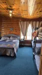 Gorgeous 4Br Log Retreat on 40 Acres —Pond View – Mid-Michigan—sleeps 11+