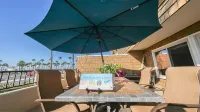 On the Boardwalk with views of the Ocean & Balboa Pier--steps to the Fun Zone