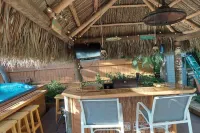 Beautiful Waterfront Hideaway Gem on Bessy Creek w/ Swim Spa, Tiki Bar Boat Lift