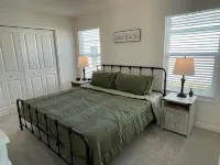 Spacious Kitchen and Cozy Patio - Charming Modern Getaway