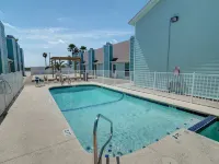 Canal Dock and Community Pool - Charming Coastal Escape
