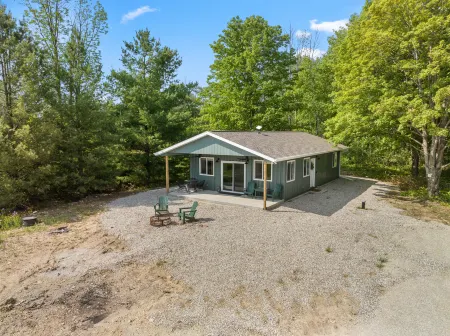 Cozy Getaway with Fire Pit and Charcoal Grill - Rustic Modern Retreat