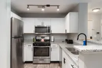 Spacious Living with Private Patio and Fast Wifi - Stylish Escape