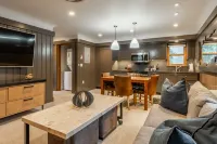 Covered Porch and Modern Amenities - Charming Cozy Escape