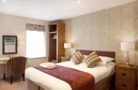 The Talbot Inn Hotels near The Old Kennels Farm Holiday Cottages