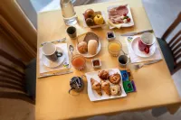 Hotel Garnì Orchidea - Aamiainen