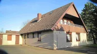 Holiday house with large garden, terrace, near the beach, pets welcome Hotels in Westerdeichstrich