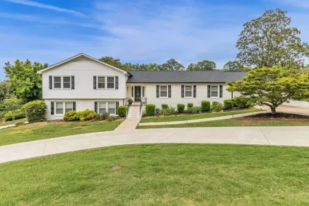 4BR Stay: Pet-Friendly, Sunroom, Fence & Fire Pit