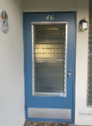 Tropical one bedroom condo steps from pool.