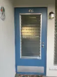 Tropical one bedroom condo steps from pool.
