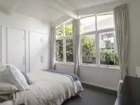 Whale Bay Surf House + Spa - Absolute Waterfront Hotels in Raglan
