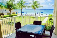 Gorgeous Ocean Views!! In the Center of 7 Mile Beach!! Walk to Most Everything!