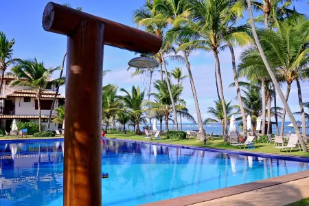 Beachfront Condo in Praia do Forte – Exclusive Beach Town Отели в г. Прайя-ду-Форте