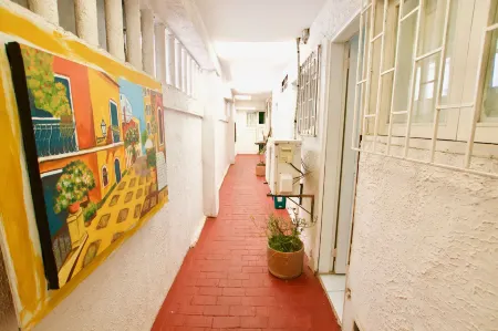 QuillaHost Guesthouse Отели в г. Барранкилья