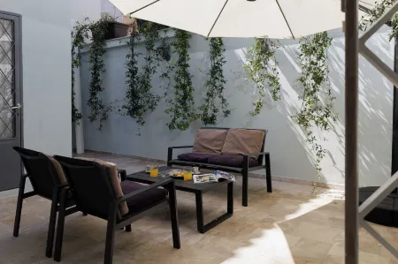 Incanto Boutique Suites - Koukaki Отели рядом с достопримечательностью «Национальный Музей Современного Искусства»