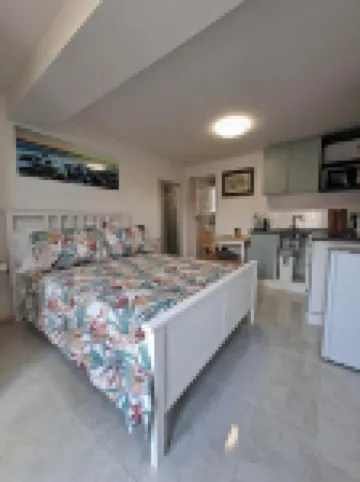 Newly built and decorated cute studio with a terrace overlooking the garden.