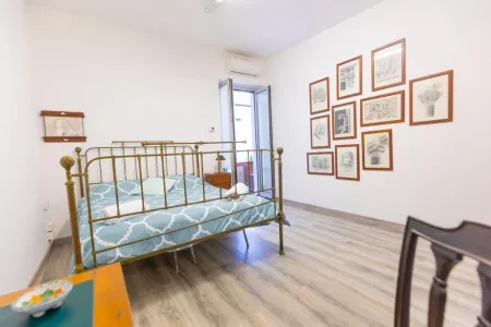 In the main square modern house Отели в г. Трекастаньи