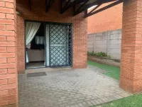 Entire 2 bedroom Duplex with wrap around garden in a secure complex