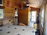 Cozy cedar/rock cabin & bunkhouse with private access to the Frio River.