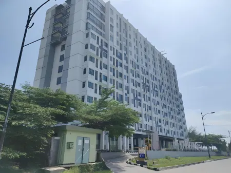 Izi Cozi Jababeka Enviro Powered by Archipelago Отели в г. East Cikarang