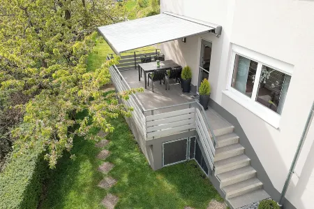 Modern furnished apartment in the green heart of Lower Franconia Отели в г. Зульцфельд