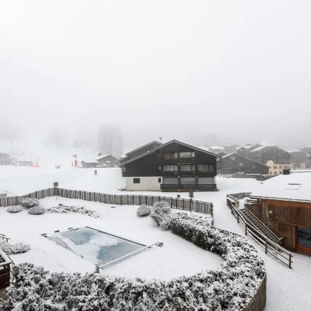 Apartment in Morillon with Pool & Mountain Views