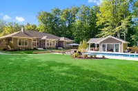 Luxury Estate–Pool, Pool House, Theater, Game Room, Putting Green–Steps to Beach