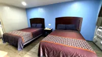 Coachman's Inn & Suites - Inns
