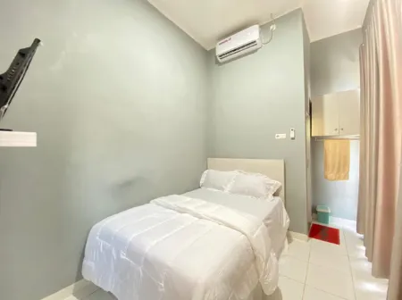 Pelangi Guest House Palembang RedPartner Отели в г. Kebun Bunga