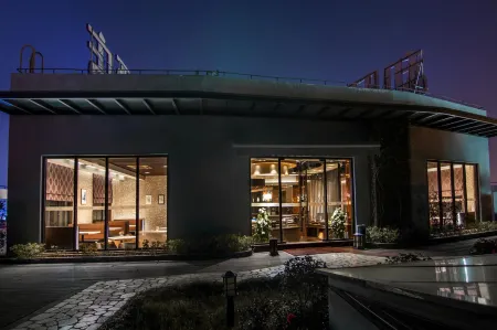 Yiju Hotel (Shanghai Chuansha Branch) Отели рядом с достопримечательностью «Residence of Family Tao»