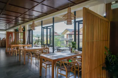 Wuzhishan Minglanshe Отели рядом с достопримечательностью «Tropic Rain Forest Scenery Spot of Five Finger Mountain»