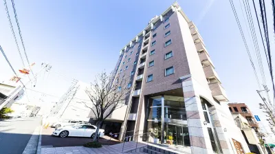 Imabari Urban Hotel (New Building) Отели рядом со станцией Станция JR Имабари