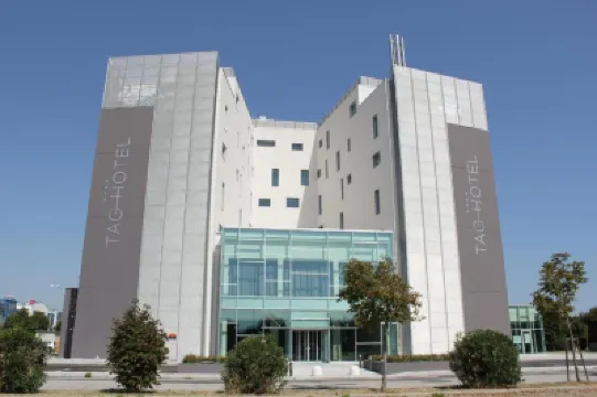 Tag Hotel Отели в г. 