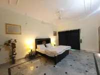 Cozy Guest Room in Rawalpindi - Shared Facilities & Free WiFi