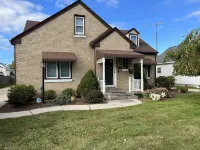 Brick Tudor Vacation Rental House Close To Lake Michigan And Downtown