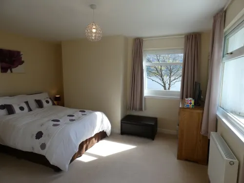 Lochside with beach access uninterrupted views of spectacular Highland Mountains