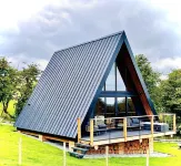 Stunning Scandinavian A Frame lodge with outside bathtub