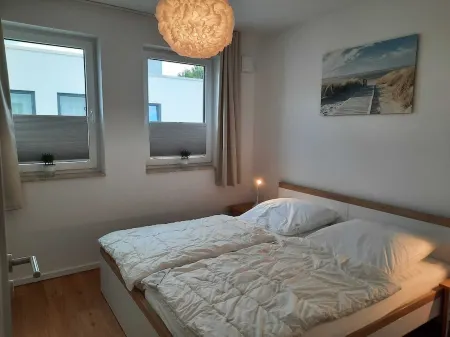 Modern top floor apartment with a view of the sea and Stralsund