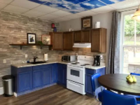 Upscale King Suite with Purple Mattress and reserved off-street parking