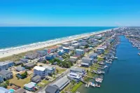 Luxury 4 bedroom townhome with ocean view steps away from the beach!