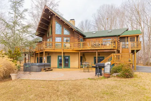 Huge Lakefront Home with private hot tub, dock, and pickle-ball court