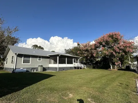 Water view Home with Dock on  Canal with access to Lake!