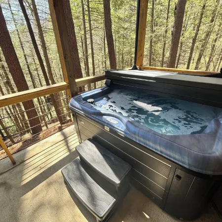 Whispering Woods_  Hot Tub _Waterfall _ Arcade _3 story Cabin