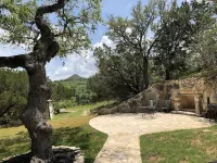 La Casita Verde Blanco on the banks of the river