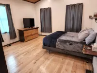 New! Custom built private home on a pond, with large hottub.