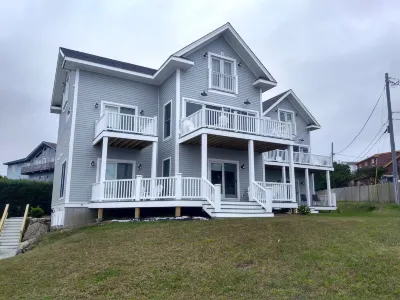 NEW! Unwind in Style: Beautiful 5BR/5BA Property with Beach Views and More!