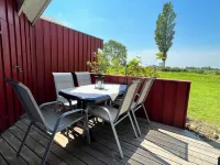 Ferienhaus "sanderling" - Gemütliches Holzhaus mit Blick auf die Schafswiesen